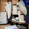 The photo shows a package with footwear in the category BS.
