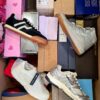 The photo shows a package with footwear in the category BS.