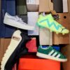 The photo shows a package with footwear in the category BS.