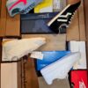 The photo shows a package with footwear in the category BS.