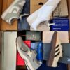 The photo shows a package with footwear in the category BS.