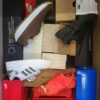 The photo shows a package with footwear in the category BS.