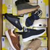 The photo shows a package with footwear in the category SM.