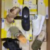 The photo shows a package with footwear in the category SM.
