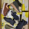 The photo shows a package with footwear in the category SM.