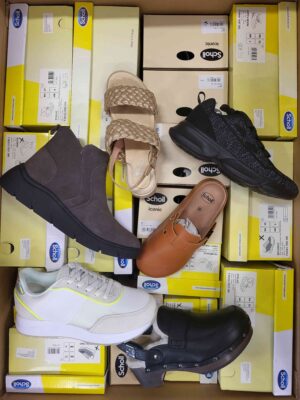 The photo shows a package with footwear in the category SM.