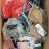 The photo shows a package with clothing in the category AU.