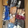 The photo shows a package with clothing in the category AU.