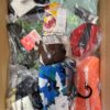 The photo shows a package with clothing in the category AU.