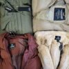The photo shows a package with clothing in the category TJ.