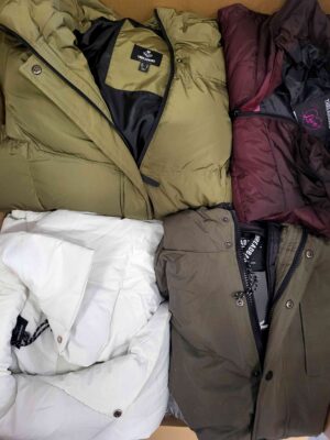 The photo shows a package with clothing in the category TJ.