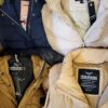 The photo shows a package with clothing in the category TJ.