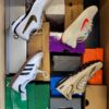 The photo shows a package with footwear in the category CS.