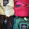 The photo shows a package with clothing in the category TJ.