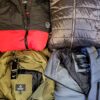 The photo shows a package with clothing in the category TJ.