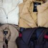 The photo shows a package with clothing in the category TJ.