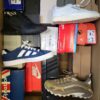 The photo shows a package with footwear in the category CS.