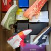 The photo shows a package with footwear in the category CS.