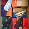 The photo shows a package with footwear in the category CS.