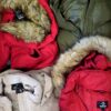 The photo shows a package with clothing in the category TJ.