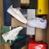 The photo shows a package with footwear in the category CS.