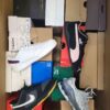 The photo shows a package with footwear in the category CS.