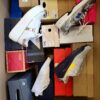 The photo shows a package with footwear in the category CS.
