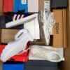 The photo shows a package with footwear in the category CS.