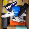 The photo shows a package with footwear in the category CS.