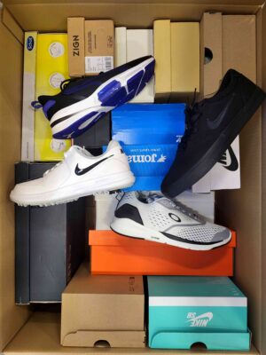 The photo shows a package with footwear in the category CS.