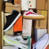 The photo shows a package with footwear in the category CS.