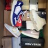The photo shows a package with footwear in the category CS.