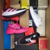 The photo shows a package with footwear in the category CS.