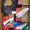 The photo shows a package with footwear in the category CS.