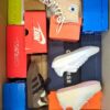 The photo shows a package with footwear in the category CS.