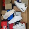 The photo shows a package with footwear in the category CS.