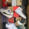 The photo shows a package with footwear in the category CS.