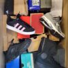 The photo shows a package with footwear in the category CS.