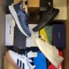 The photo shows a package with footwear in the category CS.