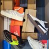 The photo shows a package with footwear in the category CS.