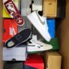 The photo shows a package with footwear in the category CS.