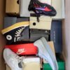 The photo shows a package with footwear in the category CS.