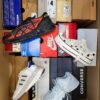 The photo shows a package with footwear in the category CS.