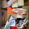 The photo shows a package with footwear in the category CS.