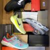 The photo shows a package with footwear in the category CS.