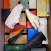 The photo shows a package with footwear in the category CS.
