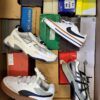 The photo shows a package with footwear in the category CS.