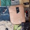 The photo shows a package with clothing in the category R.