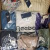 The photo shows a package with clothing in the category R.
