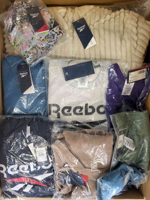 The photo shows a package with clothing in the category R.